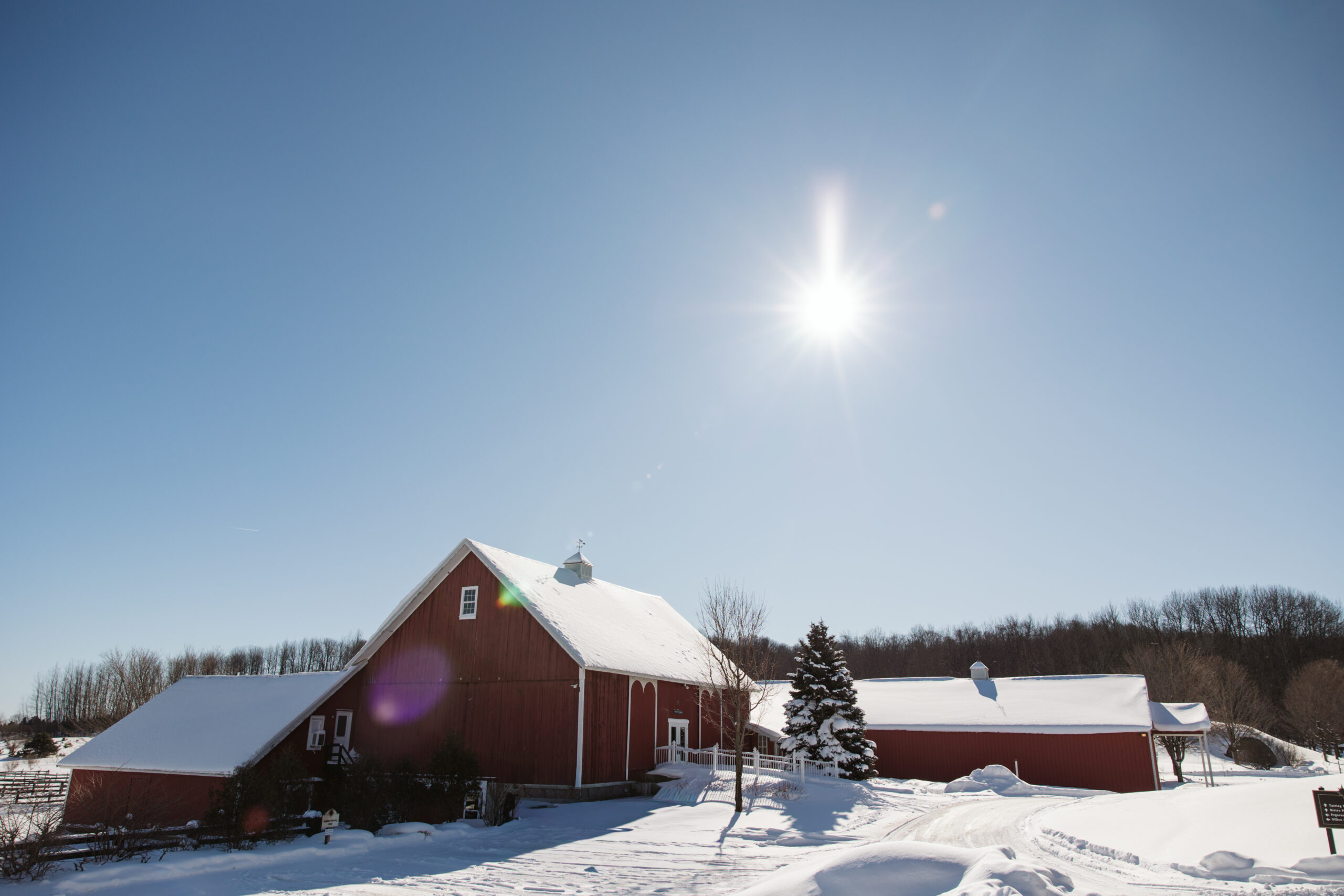 winter exterior of black star farms wintery and wedding venue in suttons bay michigan. photo by traverse city wedding photographer