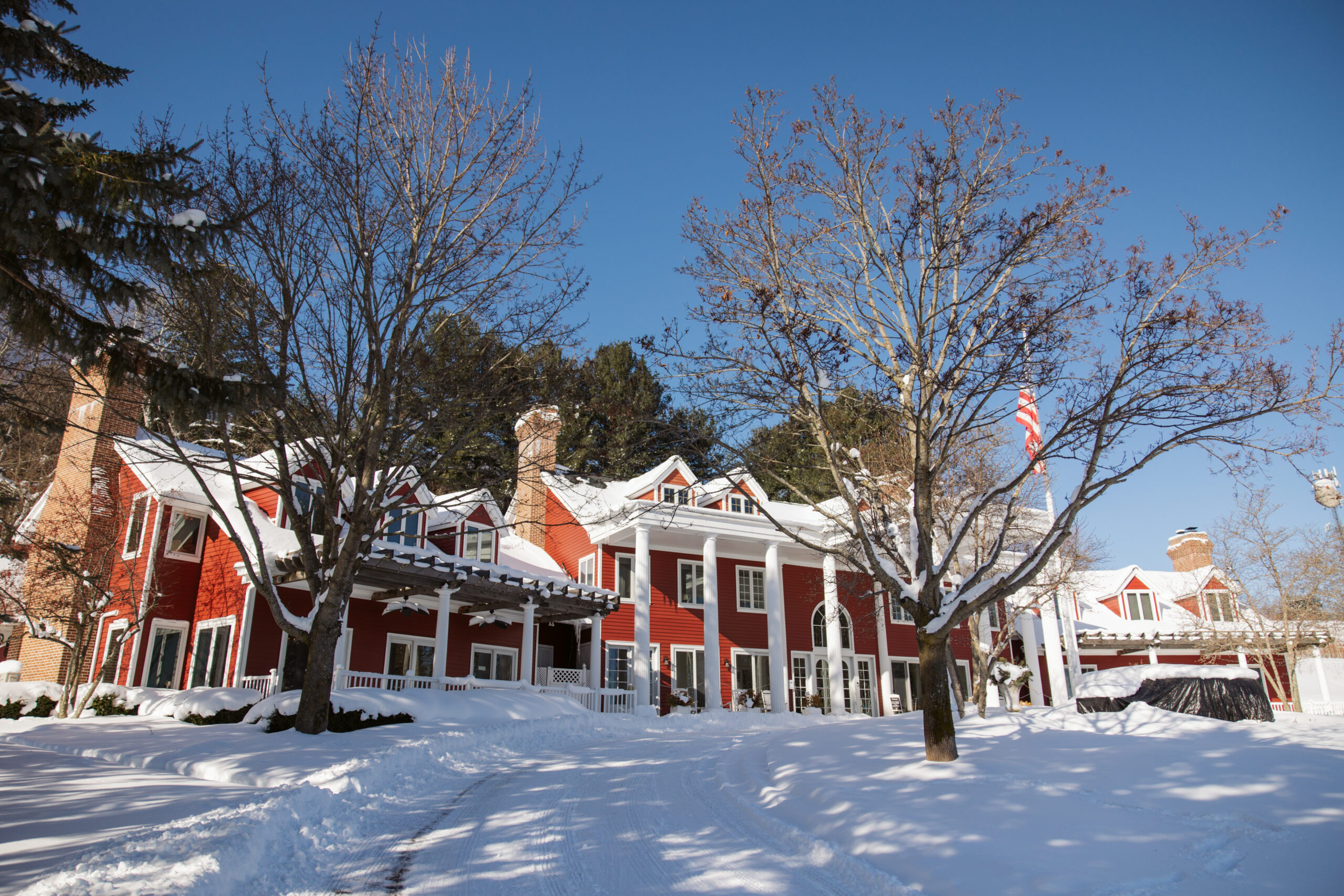 winter exterior of black star farms wintery and wedding venue in suttons bay michigan. photo by traverse city wedding photographer