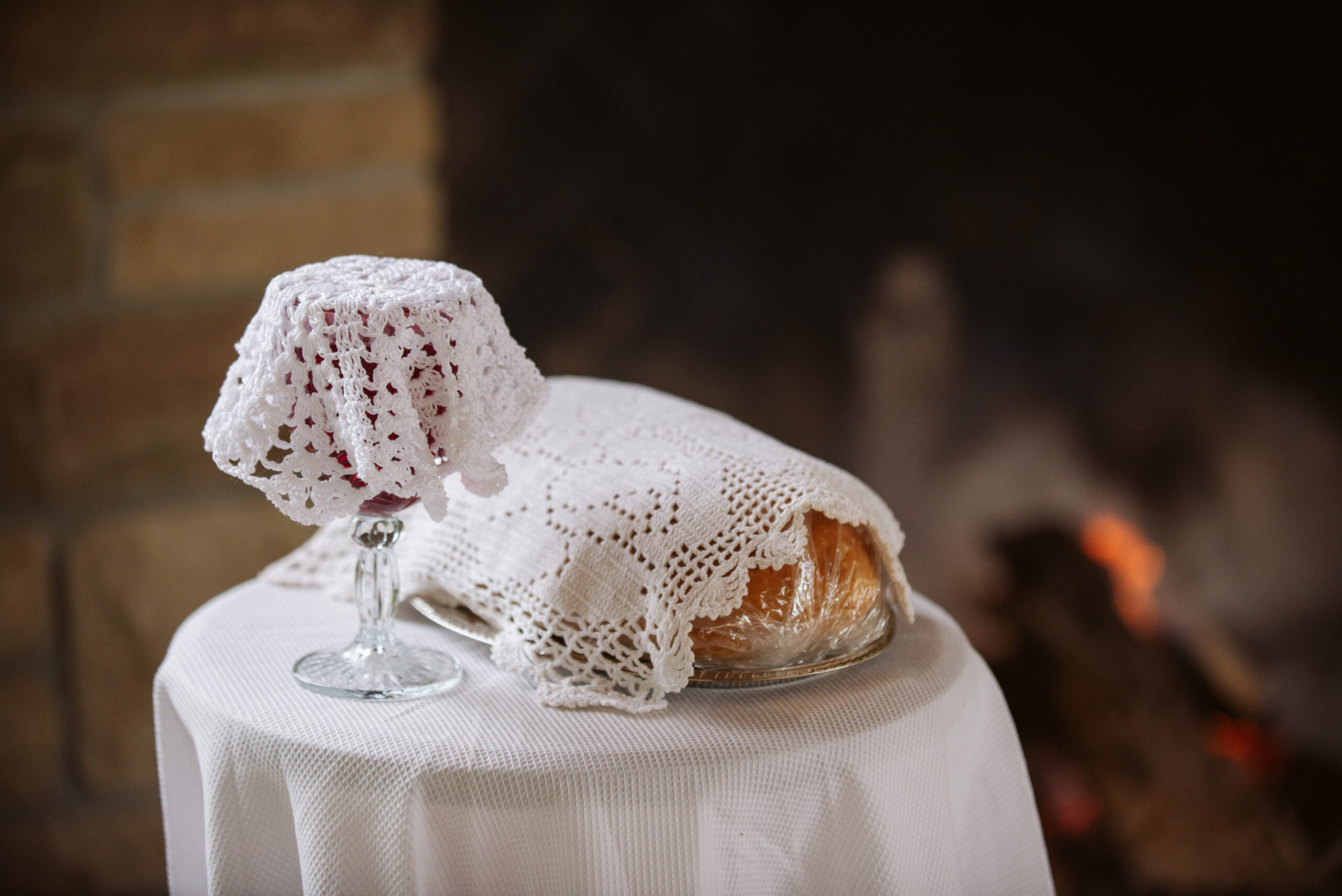 bread and wine during wedding at twin lakes campground in traverse city