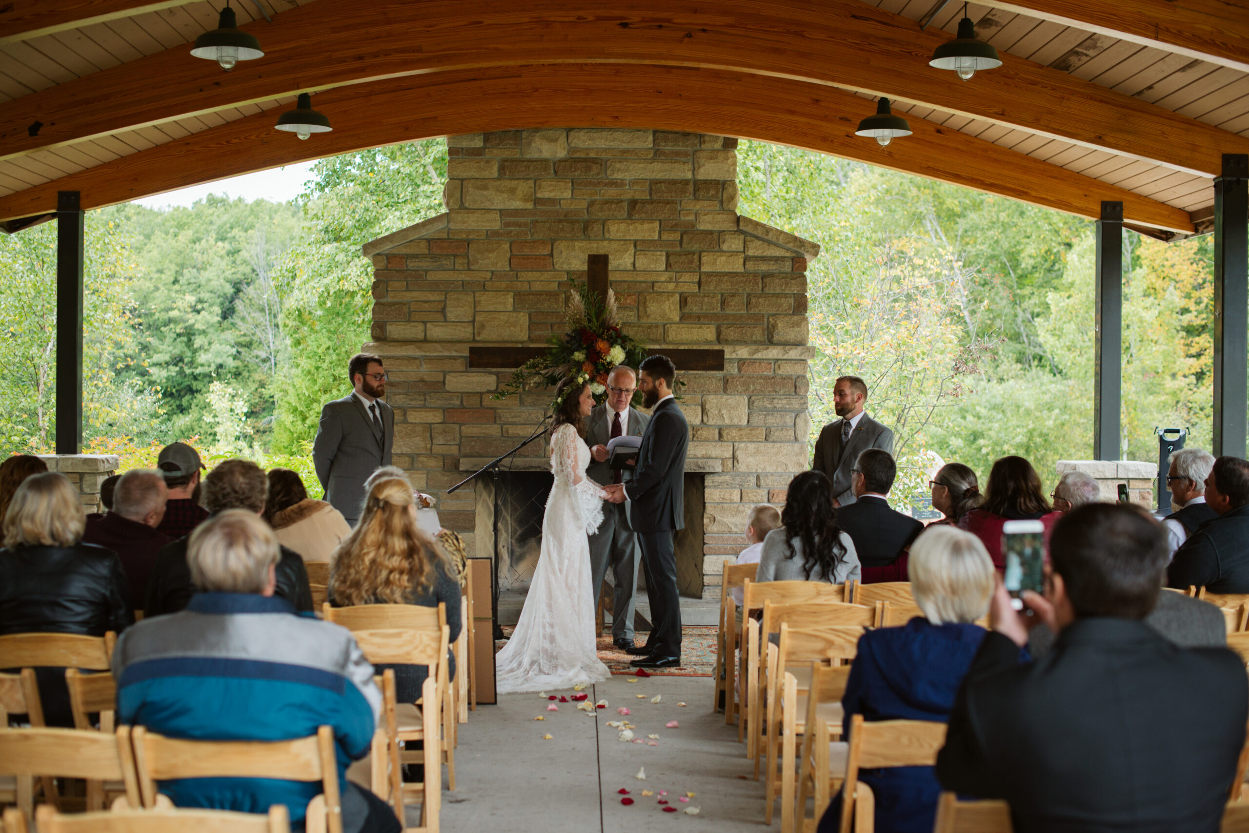 ceremony during wedding at twin lakes campground in traverse city