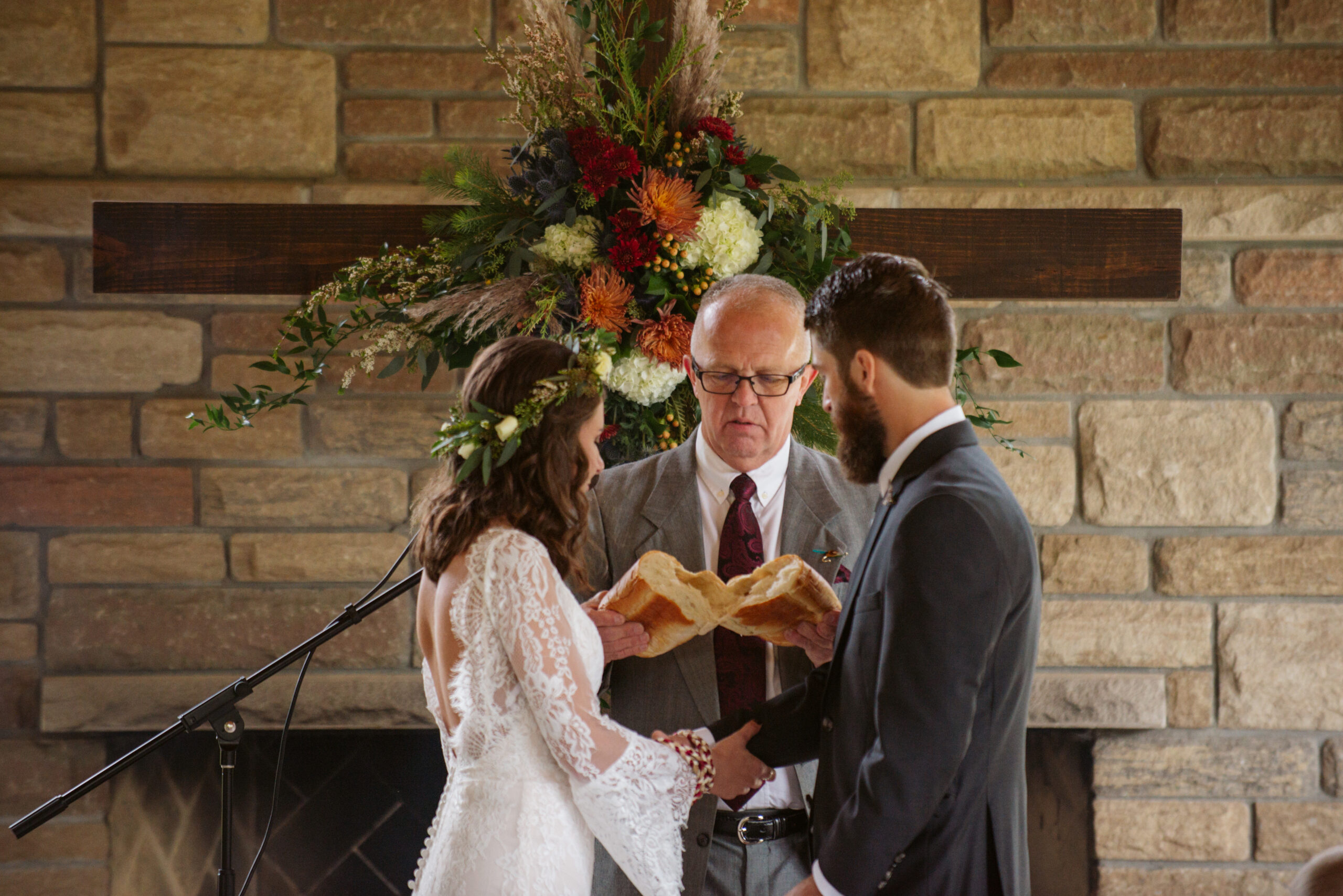 bride and groom during ceremony during wedding at twin lakes campground in traverse city