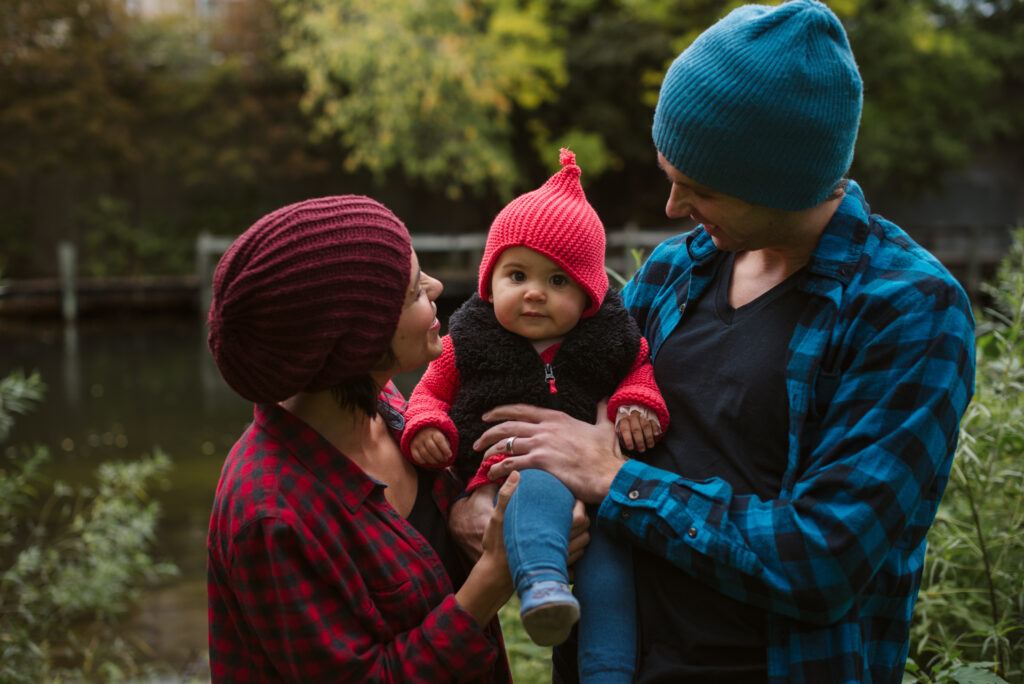 family posing for fall family photos in traverse city michigan