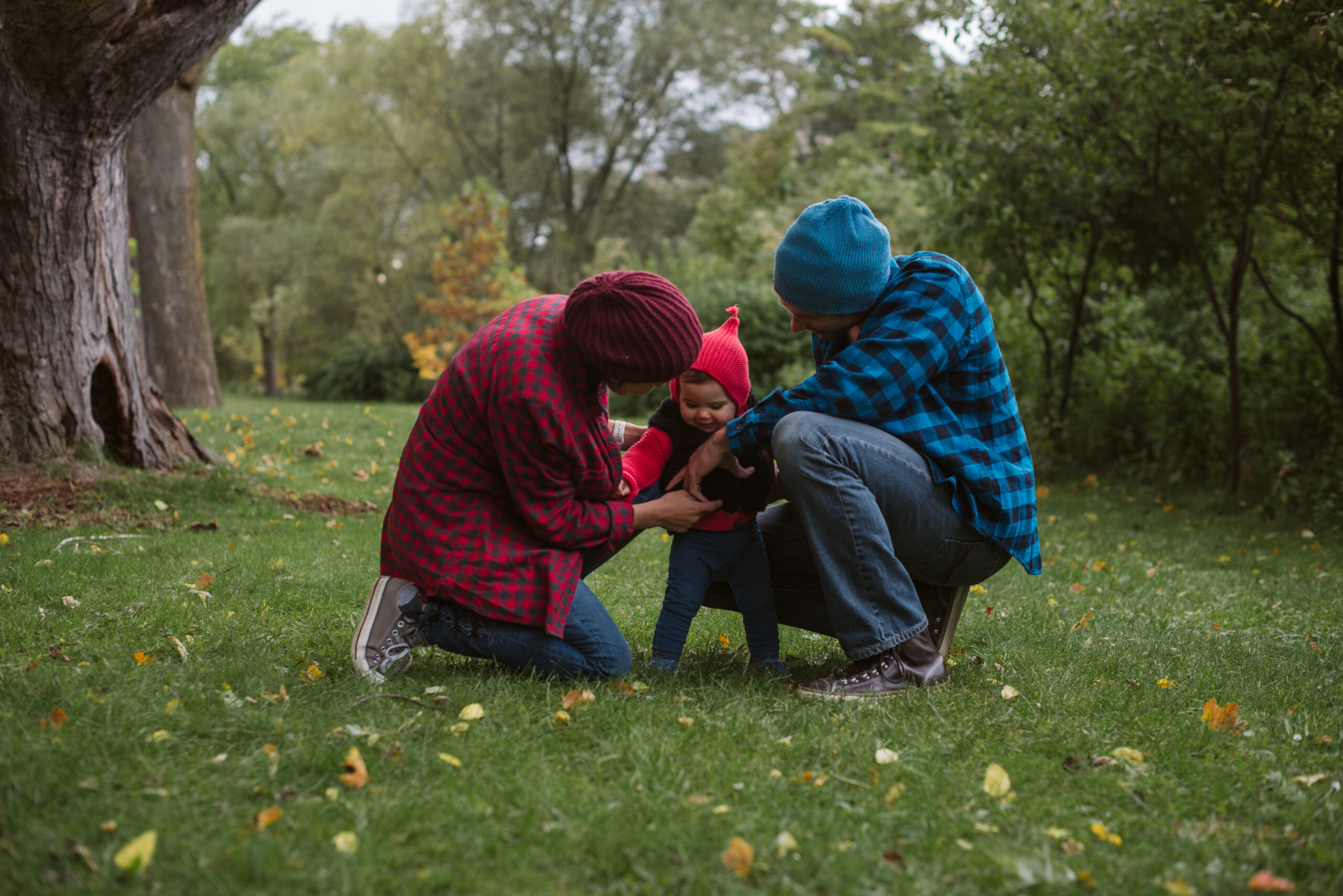family posing for fall family photos in traverse city michigan