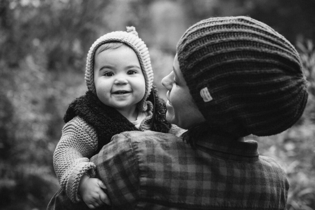 family posing for fall family photos in traverse city michigan