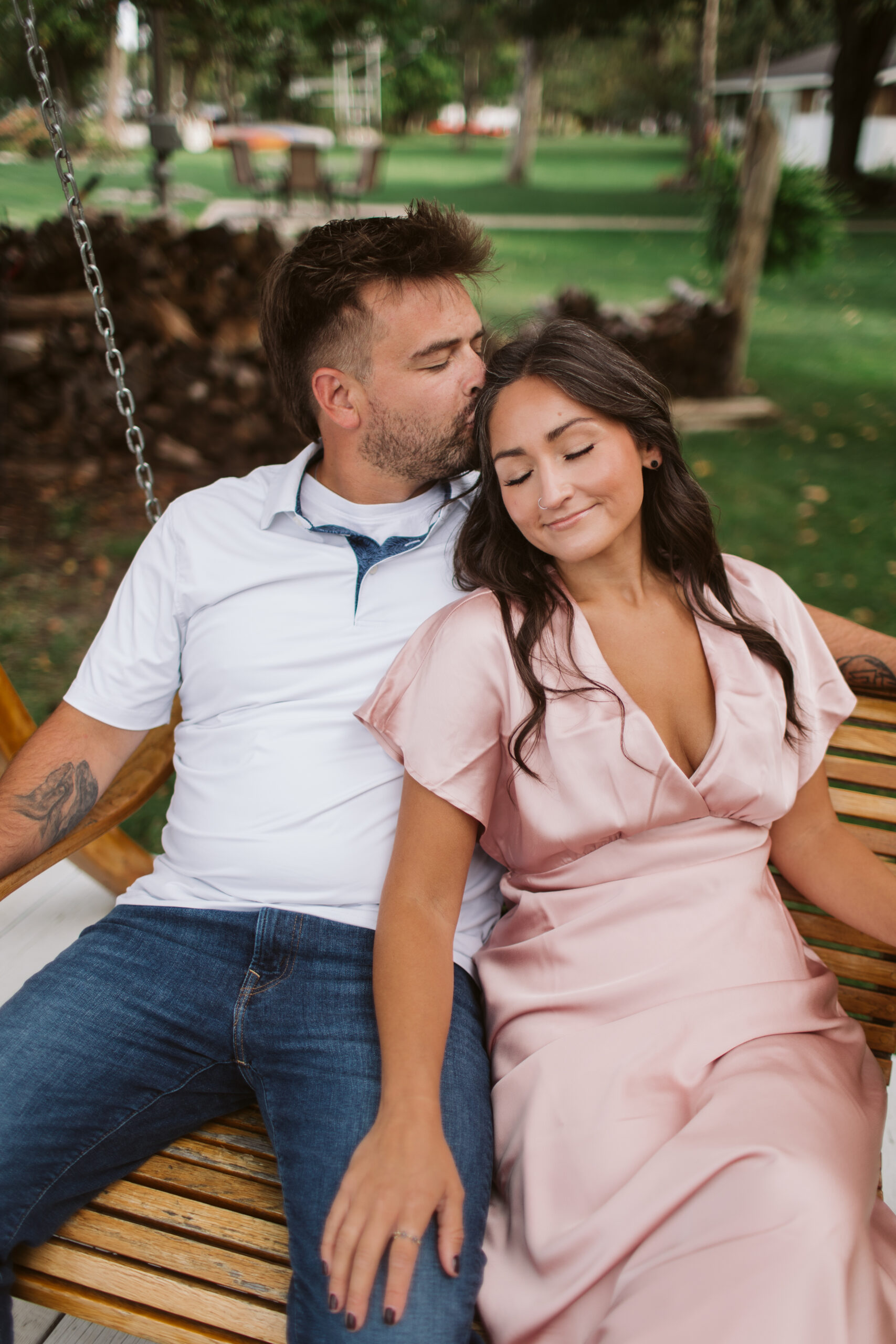 elk-rapids-wedding-photographer bride and groom on elk rapids beach in michigan during engagement photos wedding photographer